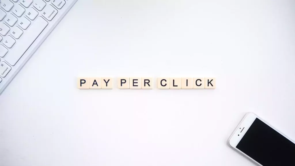 Pay Per Click text with mobile phone