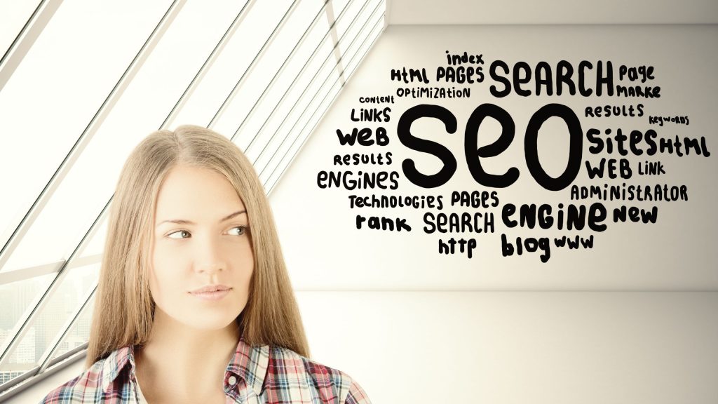 Woman in front of skylights with SEO words and phrases to the right of her in black letters